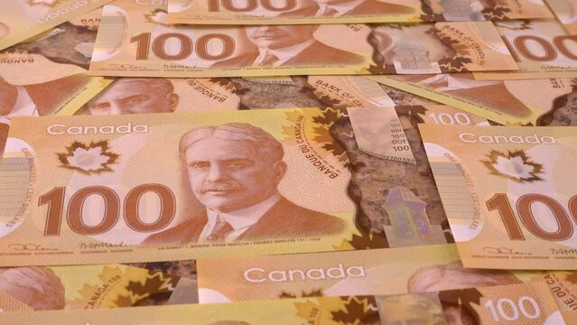 Canadian 100 dollar polymer banknotes with a portrait of Robert Borden.