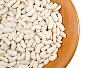 beans closeup on wooden plate