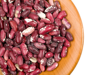 beans closeup on wooden plate