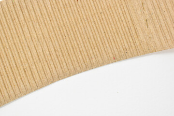closeup brown paper cardboard texture on white background