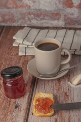toast with jam and cup of coffee