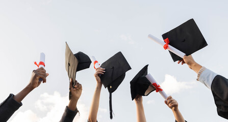 Graduation certificate and group of hands in sky with winning success in college education....