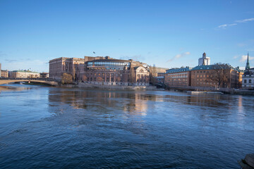 The Swedish Parliament house and the churches and castle in the old town Gamla Stan a winter day in...
