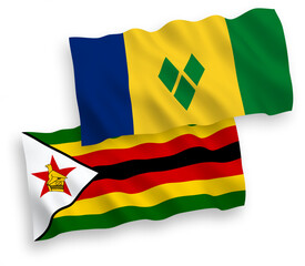 Flags of Saint Vincent and the Grenadines and Zimbabwe on a white background