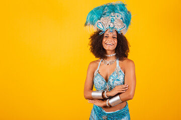 beautiful black brazilian woman with blue carnival clothes, feather crown, samba school queen....