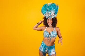 black woman queen of Brazilian samba school, with blue carnival clothes and crown of feathers....