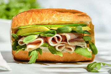 avocado and parma and cheese sandwich