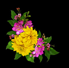 Yellow rudbeckia and freesia flowers with green leaves in a corner arrangement isolated on black