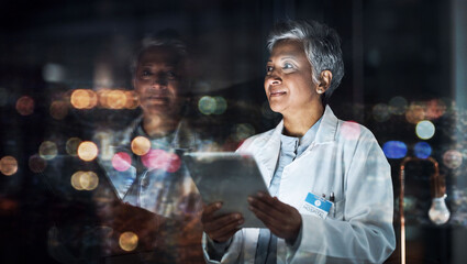 Healthcare, tablet and thinking with a doctor woman at night, working overtime in the evening after...