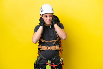 Young rock climber Brazilian man frustrated and covering ears