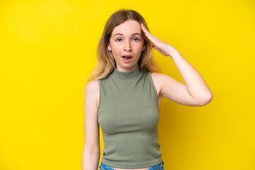 Blonde English young girl isolated on yellow background has realized something and intending the solution