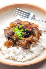 Chinese beef meat with soy sauce served with rice