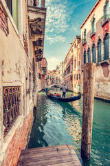 Canal in Venice, Italy with gondolier rowing gondola © Photocreo Bednarek