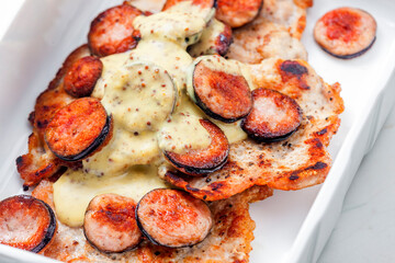 pork fillet with sausage and mustard sauce