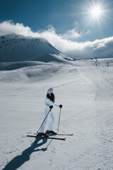 Woman skier in downhill slope
