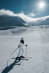 Woman skier in downhill slope