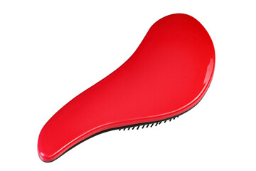 Red hair brush isolated on white background. Personal grooming accessory. File contains clipping path.