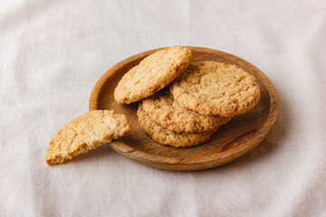 Oatmeal cookies on a wooden plate