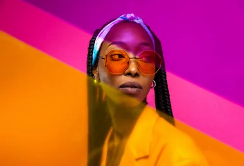 Gardinen Farbenfroh Beautiful african american woman with afro pigtails hairstyle and stylish clothes - Portrait of young black girl in studio, creative portrait with fashionable style in studio  © oneinchpunch
