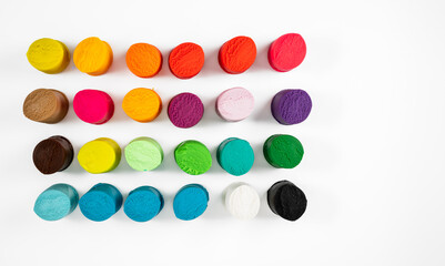 flat lay top view Soft modelling plasticine clay play dough material creative crafting for all ages in  different colours  and shades