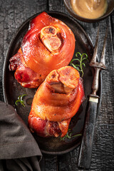 Tasty pork knuckle as regional dish in Bavaria. - obrazy, fototapety, plakaty