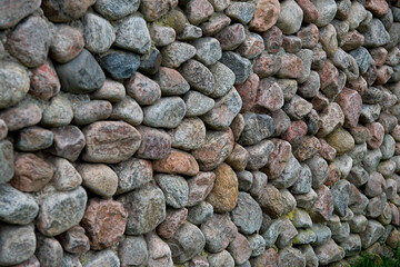 Wall made of round stones.