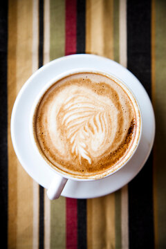 A latte on a napkin.