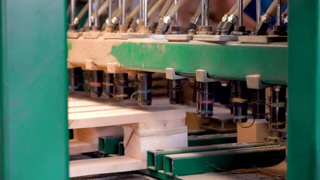Production Of Pallets. preparation for production. The Industrial Line Stacks Pallets