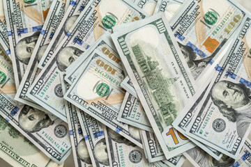 Dollars bills are many copies.