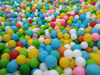 Fototapeta na wymiar lots of colorful balls on the plaground