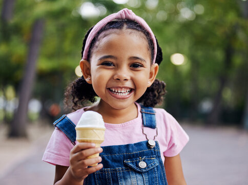 Portrait, Young Girl With Ice Cream In Park, Happy Child Outdoor With Nature And Freedom, Dessert And Smile. Travel, Happiness And Adventure, Growth And Childhood With Family Day Out And Youth Mockup