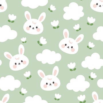 Cute white rabbit face with clouds and white flowers on a pastel green background. Kawaii animals kids seamless pattern, fabric and textile print design
