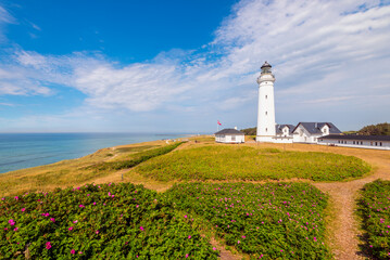 Fototapeta na wymiar Lighthouse in Hirtshals, Jutland, Denmark on summer day. The Lighthouse dates from 1863.