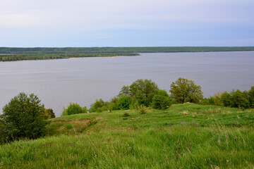 Volga river with island in the middle in cloudy day, view from the hill