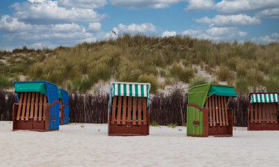 Beach chairs on the beach of island Heligoland. North sea. Germany.