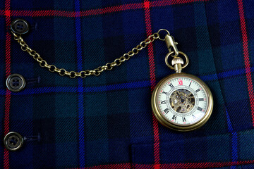 Pocket Watch and Chain on a Scottish Tartan Waistcoat Closeup