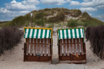 Beach chairs on the beach of island Heligoland. North sea. Germany.