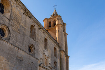 Fototapeta na wymiar View of the Iglesia Mayor Abacial in the Fortress of La Mota, Alcalá la Real (Spain), on a sunny winter morning