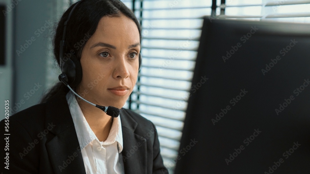 Aufkleber competent female operator working on computer and talking with clients. concept relevant to both cal