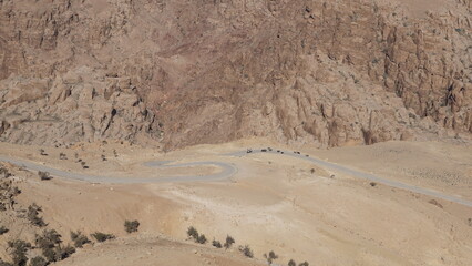 Donkeys on the road that leads down to Wadi Ghuweir in Dana in Jordan in the month of January