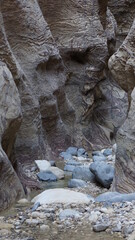 Colorful rock formations on the hiking trail in the canyon of Wadi Ghuweir in Dana in Jordan in the...