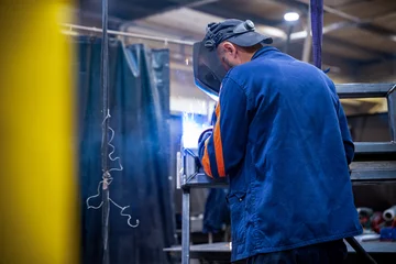 Fotobehang soudeur travailleur soudure industrie mécanique métallerie chaudronnerie usinage welder welding © Thomas