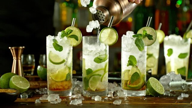 Super slow motion of preparing mojito drink. Filmed on high speed cinema camera, 1000 fps.