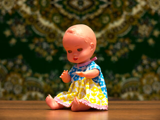 Miniature toy doll.