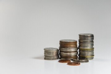 Close-up shot of pile of coins, savings, investment, finance and investment idea