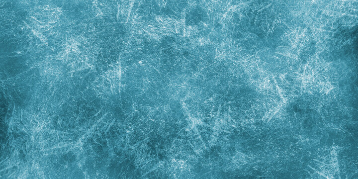Blue winter background frost ice elements or frozen water aqua texture with cold colors and white textured frosty grunge wallpaper pattern in frozen icy border backdrop header banner template design