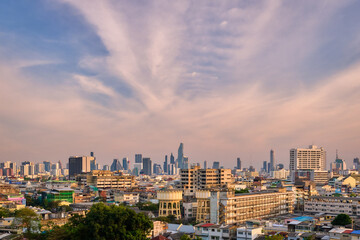 Fototapeta na wymiar Cityscape of Bangkok city center in sunset, blue sky and clouds