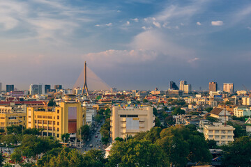 Cityscape of Bangkok city center in sunset, blue sky and clouds