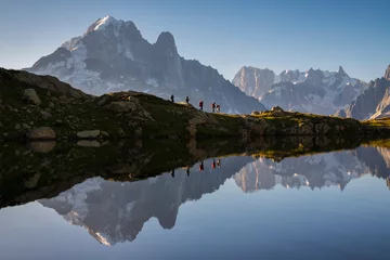 Fotobehang Mont Blanc Group of hikers near the Lacs des Chéserys, Chamonix-Mont-Blanc, Haute-Savoie, France