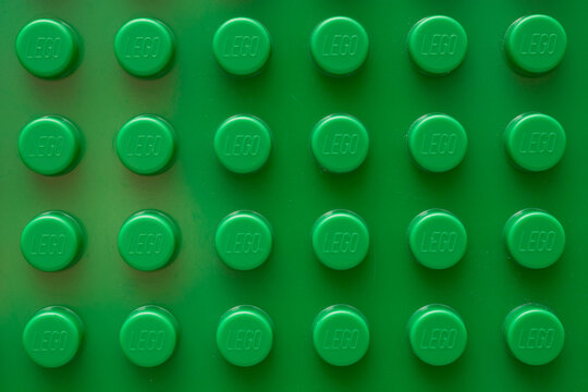 Bucharest, Romania - 01.28.2023: A part of green plastic Lego board, closeup